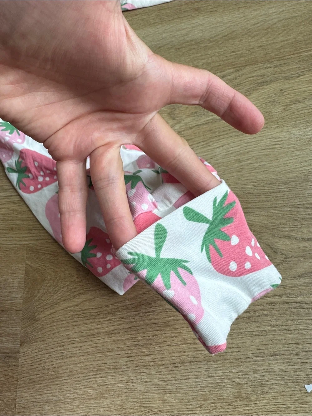 Kids Pink Strawberry Print Footie Romper. 100% organic cotton.